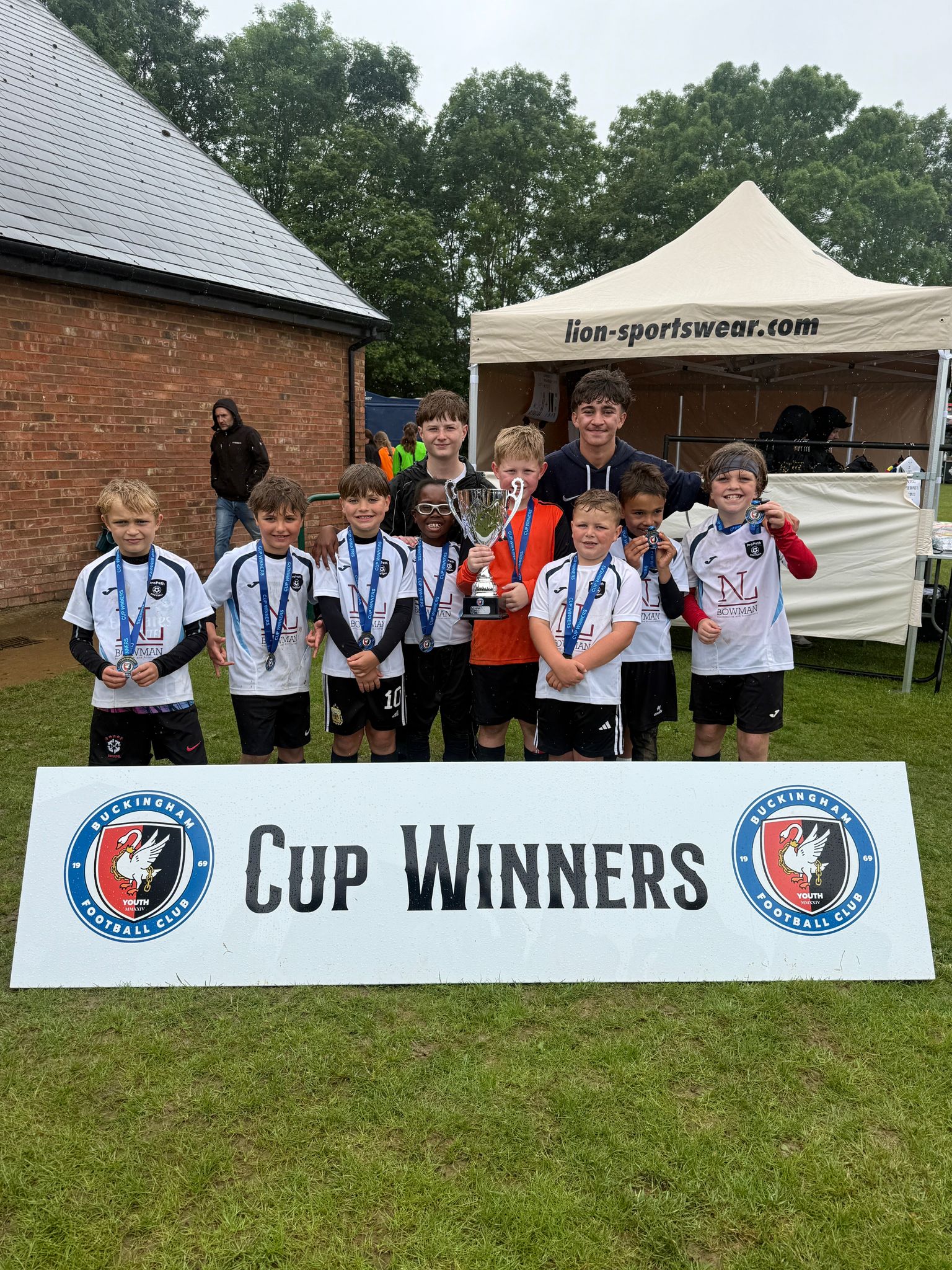 ProPath Football players celebrating as Buckingham Youth Tournament cup winners
